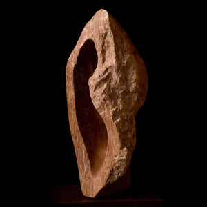 STONE CARVING OF A CAVE