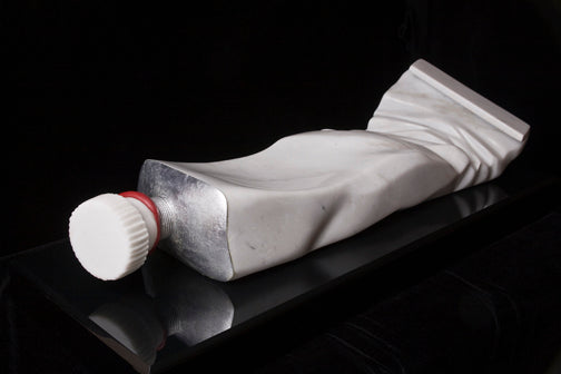 Tube: marble, steel and silver leaf; Cap: carved marble