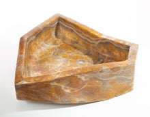 BOWL CARVED OUT OF STONE
